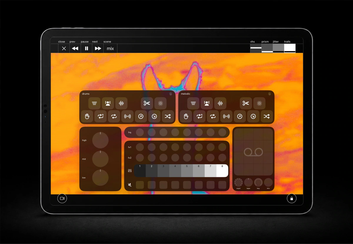 VJ-XY performance view with OP-XY mixer, punch-in effects, EQ and tape controls over orange live visuals